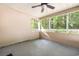 Covered porch with screened windows and a view of trees at 2405 Brick Dr., Longs, SC 29568