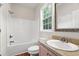 Clean bathroom featuring a shower/tub combination and vanity with storage at 265 South Causeway Rd., Pawleys Island, SC 29585