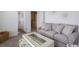 Comfortable bedroom featuring neutral tones, a couch, and an adjoining bathroom at 2800 Cook Circle # B, Myrtle Beach, SC 29577