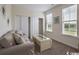 Cozy bedroom with plush carpeting, a comfortable sofa and great natural light from the windows at 2800 Cook Circle # C, Myrtle Beach, SC 29577