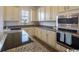 Stylish kitchen features stainless steel appliances, granite countertops, and bright cabinetry at 2800 Cook Circle # C, Myrtle Beach, SC 29577