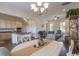 Open living space with a dining area, kitchen, and modern furnishings including a ceiling fan at 2800 Cook Circle # C, Myrtle Beach, SC 29577