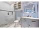 Bathroom featuring a shower and marble vanity at 290 Woodlands Way Nw # 10, Calabash, SC 28467
