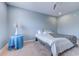 Stylized bedroom features soft blue walls, carpeted floor, and neutral color decor at 290 Woodlands Way Nw # 10, Calabash, SC 28467