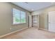 Bedroom with a window for natural light and closet with built in shelving at 290 Woodlands Way Nw # 10, Calabash, SC 28467