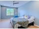 Cozy bedroom with soft blue walls, light carpet and plenty of natural light at 290 Woodlands Way Nw # 10, Calabash, SC 28467