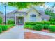 Clubhouse exterior with well-manicured landscaping and ample parking at 290 Woodlands Way Nw # 10, Calabash, SC 28467