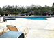 Inviting community pool with lounge chairs and well-maintained surroundings at 290 Woodlands Way Nw # 10, Calabash, SC 28467