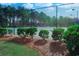 Well-maintained tennis court surrounded by lush greenery at 290 Woodlands Way Nw # 10, Calabash, SC 28467