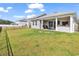 Large, grassy backyard with a patio, perfect for outdoor activities and entertaining at 305 Calhoun Falls Dr., Myrtle Beach, SC 29579