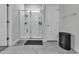 Clean bathroom featuring a glass-enclosed shower and storage at 305 Calhoun Falls Dr., Myrtle Beach, SC 29579