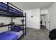 Spacious bedroom featuring a full size bunk bed with desk, neutral carpet, and ample space at 305 Calhoun Falls Dr., Myrtle Beach, SC 29579