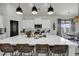Modern kitchen island with seating, pendant lighting, and sleek countertop finishes at 305 Calhoun Falls Dr., Myrtle Beach, SC 29579