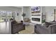 Comfortable living room with an electric fireplace, large sofas and access to outdoor space at 305 Calhoun Falls Dr., Myrtle Beach, SC 29579
