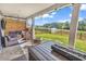 Relaxing covered patio with comfortable seating and a scenic view of the pond at 305 Calhoun Falls Dr., Myrtle Beach, SC 29579
