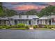 Charming townhome with well-manicured landscaping, a welcoming front porch, and an inviting curb appeal at 307 Golden Bear Dr. # 3, Pawleys Island, SC 29585