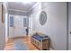 Inviting foyer with hardwood floors, neutral paint, and decorative mirror at 307 Golden Bear Dr. # 3, Pawleys Island, SC 29585