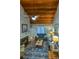 Spacious living room with vaulted ceilings, a cozy fireplace, and comfortable seating at 307 Golden Bear Dr. # 3, Pawleys Island, SC 29585
