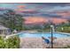Inviting community pool area with comfortable lounge chairs, offering a refreshing escape and scenic views at 307 Golden Bear Dr. # 3, Pawleys Island, SC 29585