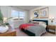 Bright bedroom featuring a large window with scenic views and modern decorative accents at 311 Glade Ct., Loris, SC 29569