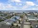Aerial view of coastal neighborhood with waterfront homes and access to the ocean at 312 47Th Ave. N, North Myrtle Beach, SC 29582