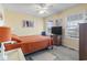 Sunny bedroom with a ceiling fan, warm tones, and bright natural lighting at 312 47Th Ave. N, North Myrtle Beach, SC 29582