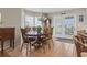 Cozy dining room with natural light, a round table, and ample seating at 312 47Th Ave. N, North Myrtle Beach, SC 29582