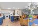 Open-concept kitchen with a breakfast bar and dining area featuring tile floors at 312 47Th Ave. N, North Myrtle Beach, SC 29582