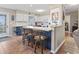 Bright kitchen with a breakfast bar and blue and white accents at 312 47Th Ave. N, North Myrtle Beach, SC 29582