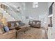 Spacious living room featuring high ceilings, large windows, and comfortable seating at 312 47Th Ave. N, North Myrtle Beach, SC 29582