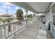 Spacious covered porch with comfortable seating, offering relaxing outdoor living at 312 47Th Ave. N, North Myrtle Beach, SC 29582