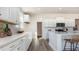 Modern kitchen featuring an island, quartz countertops, white cabinets, and stainless steel appliances at 334 Glacier Way, Conway, SC 29526