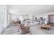 Spacious open concept living room and kitchen with lots of light and stylish decor at 334 Glacier Way, Conway, SC 29526