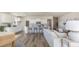 Bright living space with open floor plan, including living room, dining area, and an island kitchen at 334 Glacier Way, Conway, SC 29526