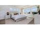 Bright main bedroom with patterned wallpaper and large windows that offer tons of natural light at 334 Glacier Way, Conway, SC 29526