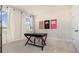 Office showcasing natural light, patterned wallpaper, and a neutral desk and chair setup at 334 Glacier Way, Conway, SC 29526