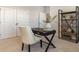 Office space with soft carpet, a black desk, a neutral chair, and a bookcase at 334 Glacier Way, Conway, SC 29526