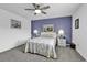 Lovely bedroom features neutral walls, soft gray carpet, and a calming blue accent wall at 405 N Hillside Dr. N # C3, North Myrtle Beach, SC 29582
