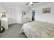 Comfortable bedroom boasts a large closet, dresser and neutral carpet at 405 N Hillside Dr. N # C3, North Myrtle Beach, SC 29582