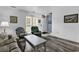 Inviting living room with gray wood floors and lots of natural light at 405 N Hillside Dr. N # C3, North Myrtle Beach, SC 29582