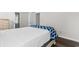 Bright bedroom with bed, dresser, and doorways to the ensuite bathroom and hallway at 408 Chesterfield Ct., Myrtle Beach, SC 29577