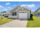 Charming single-story home boasts a well-manicured lawn and attached one car garage at 408 Chesterfield Ct., Myrtle Beach, SC 29577