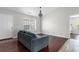 Cozy living room featuring natural light, hardwood floors, and neutral paint at 408 Chesterfield Ct., Myrtle Beach, SC 29577