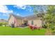 Expansive backyard with a patio and a fire pit area creates an inviting space for outdoor entertainment and relaxation at 409 Hunley Ln., Myrtle Beach, SC 29577
