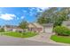 Inviting single-story home with a well-maintained lawn and charming curb appeal in a friendly neighborhood setting at 409 Hunley Ln., Myrtle Beach, SC 29577