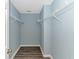 Walk-in closet with plenty of storage and wood-look flooring at 409 Hunley Ln., Myrtle Beach, SC 29577