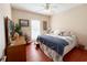 Bright bedroom with hardwood floors, a ceiling fan, and a window with natural light at 4266 Arabella Way, Little River, SC 29566