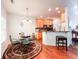 Eat-in kitchen with wood cabinets, stainless appliances, granite counters, and eat-in breakfast bar at 4266 Arabella Way, Little River, SC 29566
