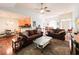 Open concept living room and kitchen with hardwood floors and lots of natural light at 4266 Arabella Way, Little River, SC 29566
