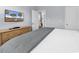 Comfortable bedroom featuring a queen bed, a dresser with a flat-screen TV, and views of the rest of the home at 4698 Cloisters Ln., Myrtle Beach, SC 29577